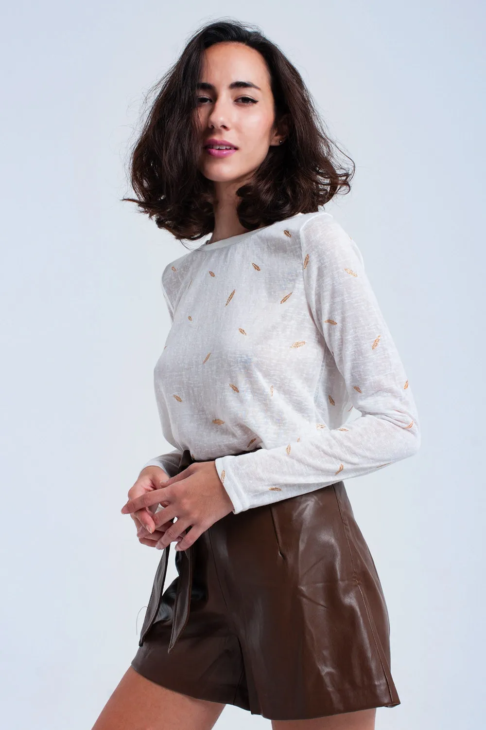 Cream sweater with printed detail